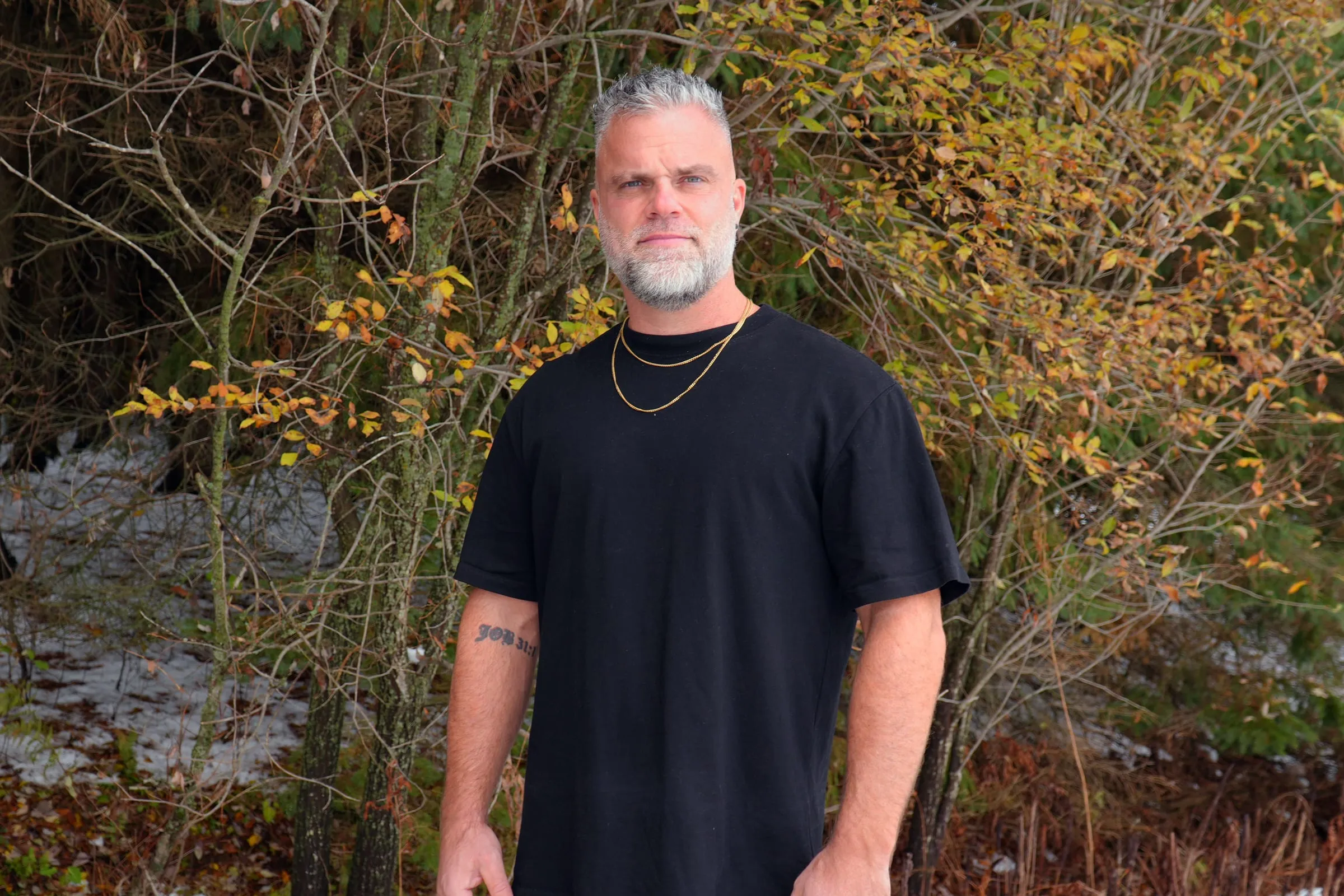 Portrait of Shawn Gabie outdoors in autumn woods